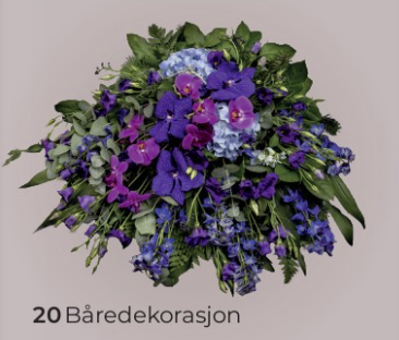 Lilla blomster i båredekorasjon