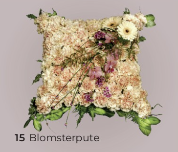 Gylne blomster formet som pute